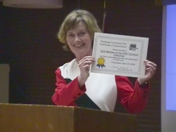 [Photo: Chair Marilyn MacDonald with Certificate of Appreciation] 