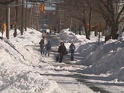 [Photo: People getting around after major blizzard.]  