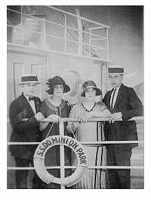 (Image: Group Photo of Two Men and Two Women.)