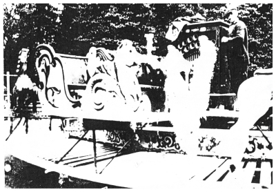 (Image: An Attendant stands beside the Music Source)