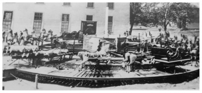 (Image: Early `Carry-Us-All' Carousel seen at the Parker
  Factory Grounds)