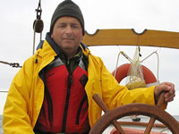 Peter at the helm in the Cabot Strait