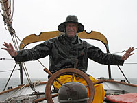 Ed at the helm near Rencontre Island in Fortune Bay