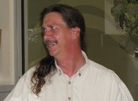 (Image: A photo of Allan Kavanaugh during his presentation.)