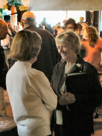 [Photo: N.S. MP Alexa McDonough and Chebucto Chair Marilyn MacDonald talk.] 