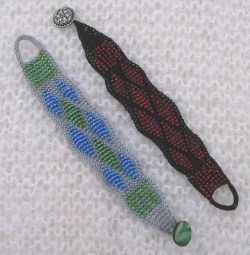 Knitted beaded bracelet with button closure.