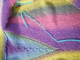 One yarn being used to mark a series of short rows
