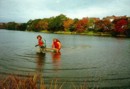 Biologist, Monica Gaertner, and assistant, Angie, practicing kick-n-sweep at Maynard Lake during Fall of 1998