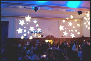 (Image: Stars Blanket a Room Lit in Deep Blue)