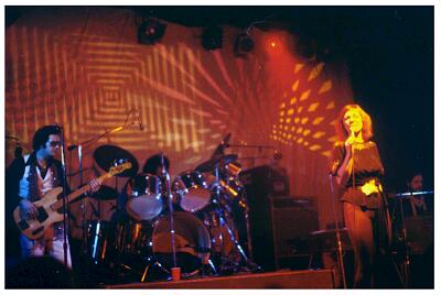 (Image: Charity Brown on Stage with Mirror Ball `Dots' and Fog)