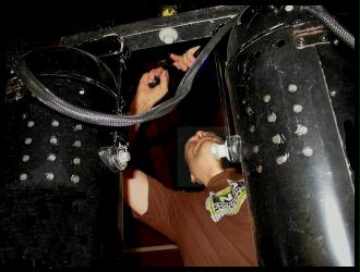 (Image Left: Richard Hangs a Light Bar at a Recent
 Event)