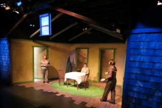 (Image: Three SIsters in the Living Room as Night Decends Outside)